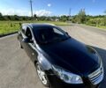 Черный Опель Инсигния, объемом двигателя 2 л и пробегом 195 тыс. км за 7700 $, фото 1 на Automoto.ua