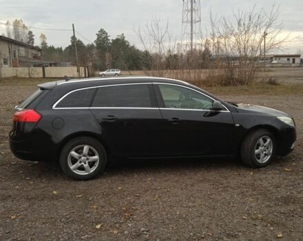 Черный Опель Инсигния, объемом двигателя 1.6 л и пробегом 240 тыс. км за 5600 $, фото 1 на Automoto.ua