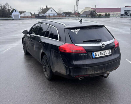 Черный Опель Инсигния, объемом двигателя 2 л и пробегом 265 тыс. км за 7250 $, фото 6 на Automoto.ua