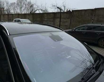 Чорний Опель Інсігнія, об'ємом двигуна 1.96 л та пробігом 412 тис. км за 6950 $, фото 2 на Automoto.ua