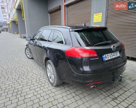 Чорний Опель Інсігнія, об'ємом двигуна 1.96 л та пробігом 412 тис. км за 6950 $, фото 4 на Automoto.ua
