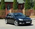 Черный Опель Инсигния, объемом двигателя 2 л и пробегом 290 тыс. км за 8115 $, фото 1 на Automoto.ua