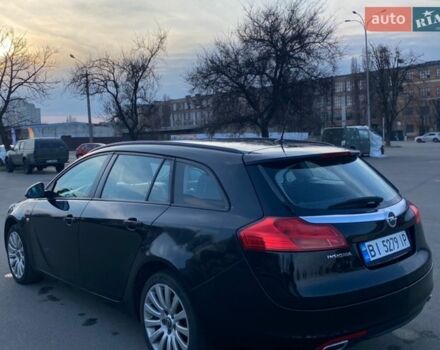 Чорний Опель Інсігнія, об'ємом двигуна 1.6 л та пробігом 236 тис. км за 6599 $, фото 8 на Automoto.ua