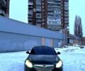 Черный Опель Инсигния, объемом двигателя 2 л и пробегом 199 тыс. км за 7500 $, фото 1 на Automoto.ua