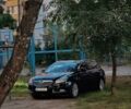 Черный Опель Инсигния, объемом двигателя 2 л и пробегом 280 тыс. км за 7300 $, фото 1 на Automoto.ua
