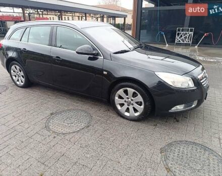Черный Опель Инсигния, объемом двигателя 1.96 л и пробегом 177 тыс. км за 6500 $, фото 1 на Automoto.ua
