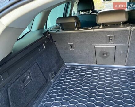 Черный Опель Инсигния, объемом двигателя 1.96 л и пробегом 208 тыс. км за 7750 $, фото 27 на Automoto.ua