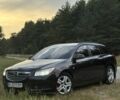 Чорний Опель Інсігнія, об'ємом двигуна 2 л та пробігом 220 тис. км за 7899 $, фото 1 на Automoto.ua