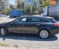 Чорний Опель Інсігнія, об'ємом двигуна 2 л та пробігом 211 тис. км за 9900 $, фото 2 на Automoto.ua