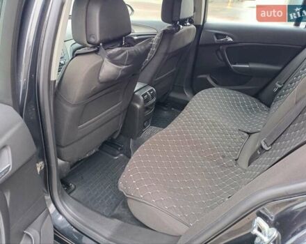 Чорний Опель Інсігнія, об'ємом двигуна 1.96 л та пробігом 179 тис. км за 6399 $, фото 12 на Automoto.ua