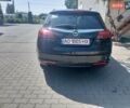 Чорний Опель Інсігнія, об'ємом двигуна 1.96 л та пробігом 310 тис. км за 7700 $, фото 3 на Automoto.ua