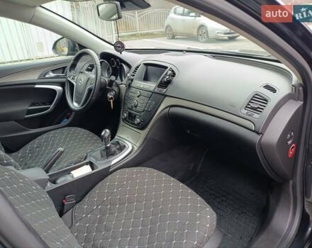 Чорний Опель Інсігнія, об'ємом двигуна 1.96 л та пробігом 179 тис. км за 6399 $, фото 13 на Automoto.ua