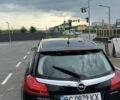 Чорний Опель Інсігнія, об'ємом двигуна 2 л та пробігом 330 тис. км за 6800 $, фото 4 на Automoto.ua