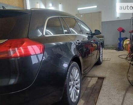 Черный Опель Инсигния, объемом двигателя 2 л и пробегом 265 тыс. км за 7700 $, фото 2 на Automoto.ua