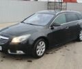 Черный Опель Инсигния, объемом двигателя 2 л и пробегом 243 тыс. км за 7500 $, фото 1 на Automoto.ua