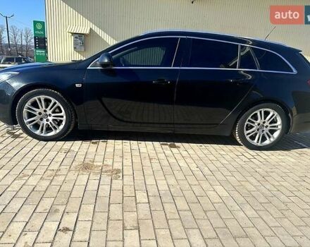 Чорний Опель Інсігнія, об'ємом двигуна 2 л та пробігом 296 тис. км за 7000 $, фото 1 на Automoto.ua