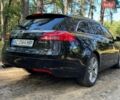 Чорний Опель Інсігнія, об'ємом двигуна 2 л та пробігом 325 тис. км за 6500 $, фото 6 на Automoto.ua
