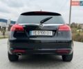 Чорний Опель Інсігнія, об'ємом двигуна 1.96 л та пробігом 330 тис. км за 6950 $, фото 4 на Automoto.ua