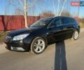 Черный Опель Инсигния, объемом двигателя 1.6 л и пробегом 206 тыс. км за 8000 $, фото 2 на Automoto.ua