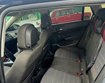 Чорний Опель Інсігнія, об'ємом двигуна 2 л та пробігом 296 тис. км за 7000 $, фото 10 на Automoto.ua