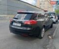 Черный Опель Инсигния, объемом двигателя 2 л и пробегом 325 тыс. км за 7200 $, фото 2 на Automoto.ua
