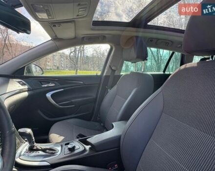 Черный Опель Инсигния, объемом двигателя 1.96 л и пробегом 190 тыс. км за 8600 $, фото 4 на Automoto.ua