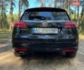 Чорний Опель Інсігнія, об'ємом двигуна 2 л та пробігом 325 тис. км за 6500 $, фото 7 на Automoto.ua