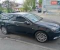 Черный Опель Инсигния, объемом двигателя 2 л и пробегом 325 тыс. км за 7200 $, фото 1 на Automoto.ua