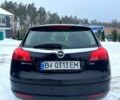 Чорний Опель Інсігнія, об'ємом двигуна 2 л та пробігом 280 тис. км за 6500 $, фото 6 на Automoto.ua
