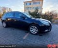 Черный Опель Инсигния, объемом двигателя 1.6 л и пробегом 235 тыс. км за 7800 $, фото 1 на Automoto.ua