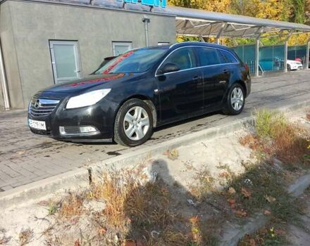 Черный Опель Инсигния, объемом двигателя 1.96 л и пробегом 372 тыс. км за 7200 $, фото 1 на Automoto.ua