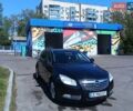 Черный Опель Инсигния, объемом двигателя 1.96 л и пробегом 259 тыс. км за 6000 $, фото 1 на Automoto.ua