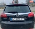 Чорний Опель Інсігнія, об'ємом двигуна 1.96 л та пробігом 260 тис. км за 5999 $, фото 9 на Automoto.ua