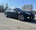 Чорний Опель Інсігнія, об'ємом двигуна 2 л та пробігом 295 тис. км за 7999 $, фото 4 на Automoto.ua