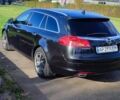 Чорний Опель Інсігнія, об'ємом двигуна 1.96 л та пробігом 267 тис. км за 7534 $, фото 1 на Automoto.ua