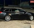 Чорний Опель Інсігнія, об'ємом двигуна 2 л та пробігом 296 тис. км за 7000 $, фото 4 на Automoto.ua