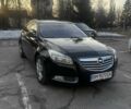 Чорний Опель Інсігнія, об'ємом двигуна 2 л та пробігом 309 тис. км за 6600 $, фото 1 на Automoto.ua