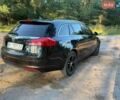 Чорний Опель Інсігнія, об'ємом двигуна 1.96 л та пробігом 325 тис. км за 7999 $, фото 10 на Automoto.ua