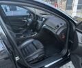Черный Опель Инсигния, объемом двигателя 2 л и пробегом 205 тыс. км за 6500 $, фото 5 на Automoto.ua