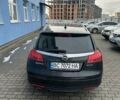 Чорний Опель Інсігнія, об'ємом двигуна 1.96 л та пробігом 306 тис. км за 6500 $, фото 4 на Automoto.ua