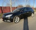 Черный Опель Инсигния, объемом двигателя 1.6 л и пробегом 206 тыс. км за 8000 $, фото 1 на Automoto.ua