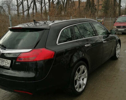 Черный Опель Инсигния, объемом двигателя 2 л и пробегом 310 тыс. км за 7500 $, фото 4 на Automoto.ua