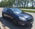Черный Опель Инсигния, объемом двигателя 2 л и пробегом 289 тыс. км за 6700 $, фото 1 на Automoto.ua