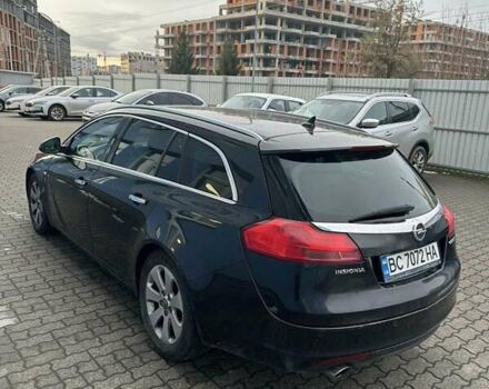 Чорний Опель Інсігнія, об'ємом двигуна 1.96 л та пробігом 306 тис. км за 6500 $, фото 3 на Automoto.ua