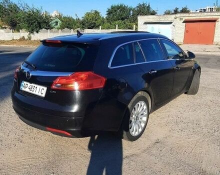 Чорний Опель Інсігнія, об'ємом двигуна 2 л та пробігом 180 тис. км за 8400 $, фото 2 на Automoto.ua