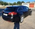 Чорний Опель Інсігнія, об'ємом двигуна 2 л та пробігом 180 тис. км за 8400 $, фото 2 на Automoto.ua