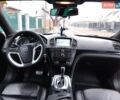 Черный Опель Инсигния, объемом двигателя 2 л и пробегом 217 тыс. км за 8500 $, фото 1 на Automoto.ua