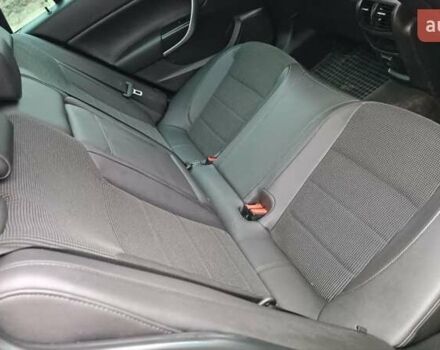 Черный Опель Инсигния, объемом двигателя 2 л и пробегом 215 тыс. км за 7250 $, фото 57 на Automoto.ua