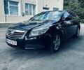 Чорний Опель Інсігнія, об'ємом двигуна 1.96 л та пробігом 191 тис. км за 6599 $, фото 1 на Automoto.ua