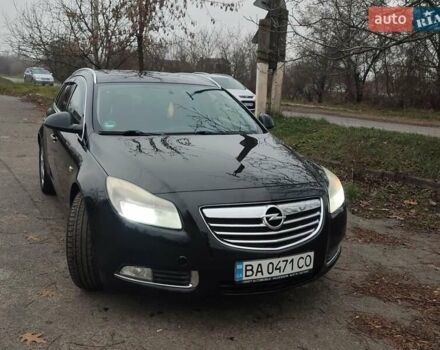 Черный Опель Инсигния, объемом двигателя 2 л и пробегом 265 тыс. км за 5750 $, фото 3 на Automoto.ua